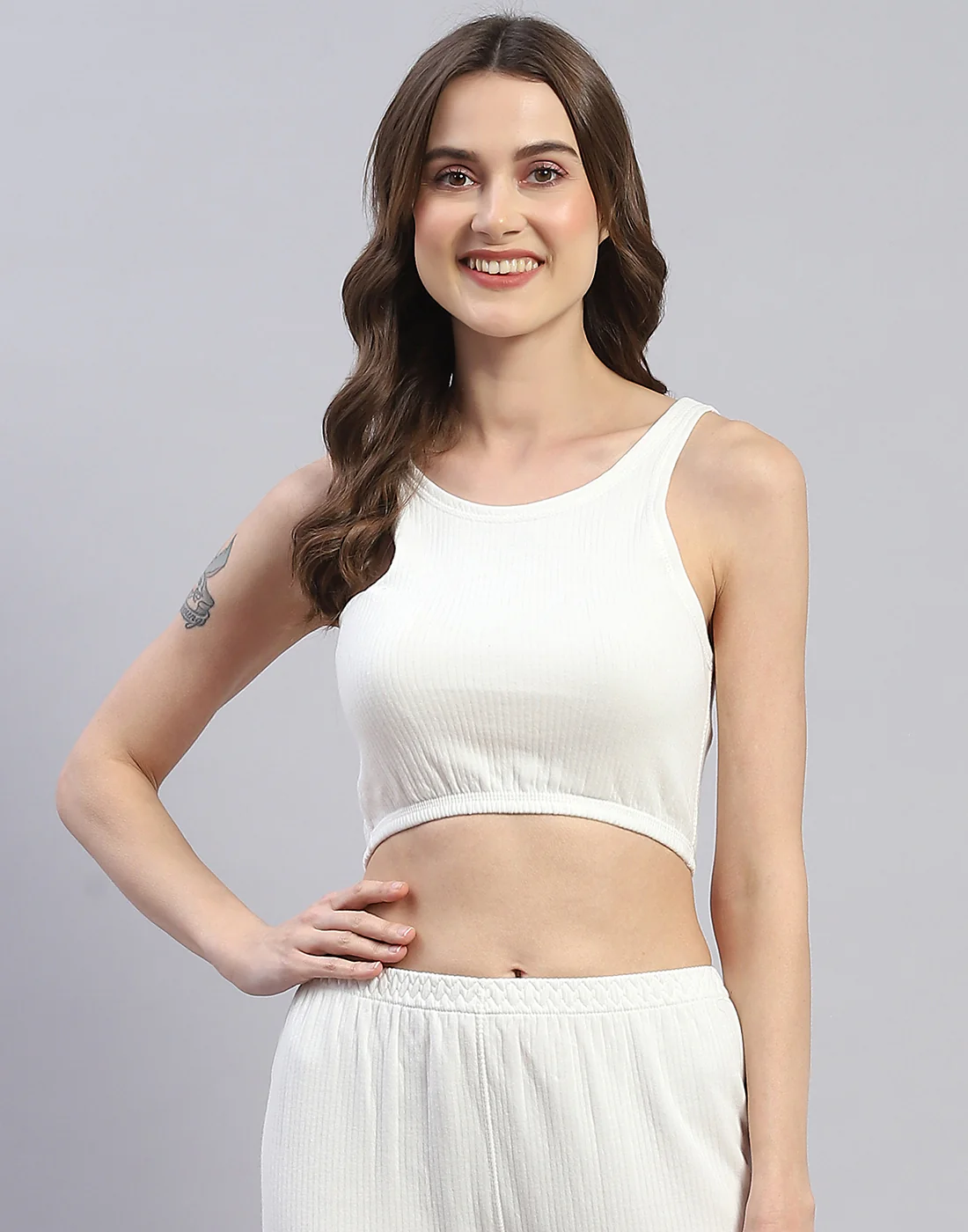 Women Off White Solid Round Neck Sleeveless Thermal Blouse - Image 2